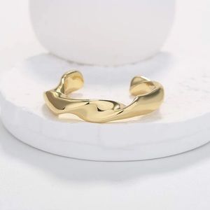 Adjustable gold plated ring